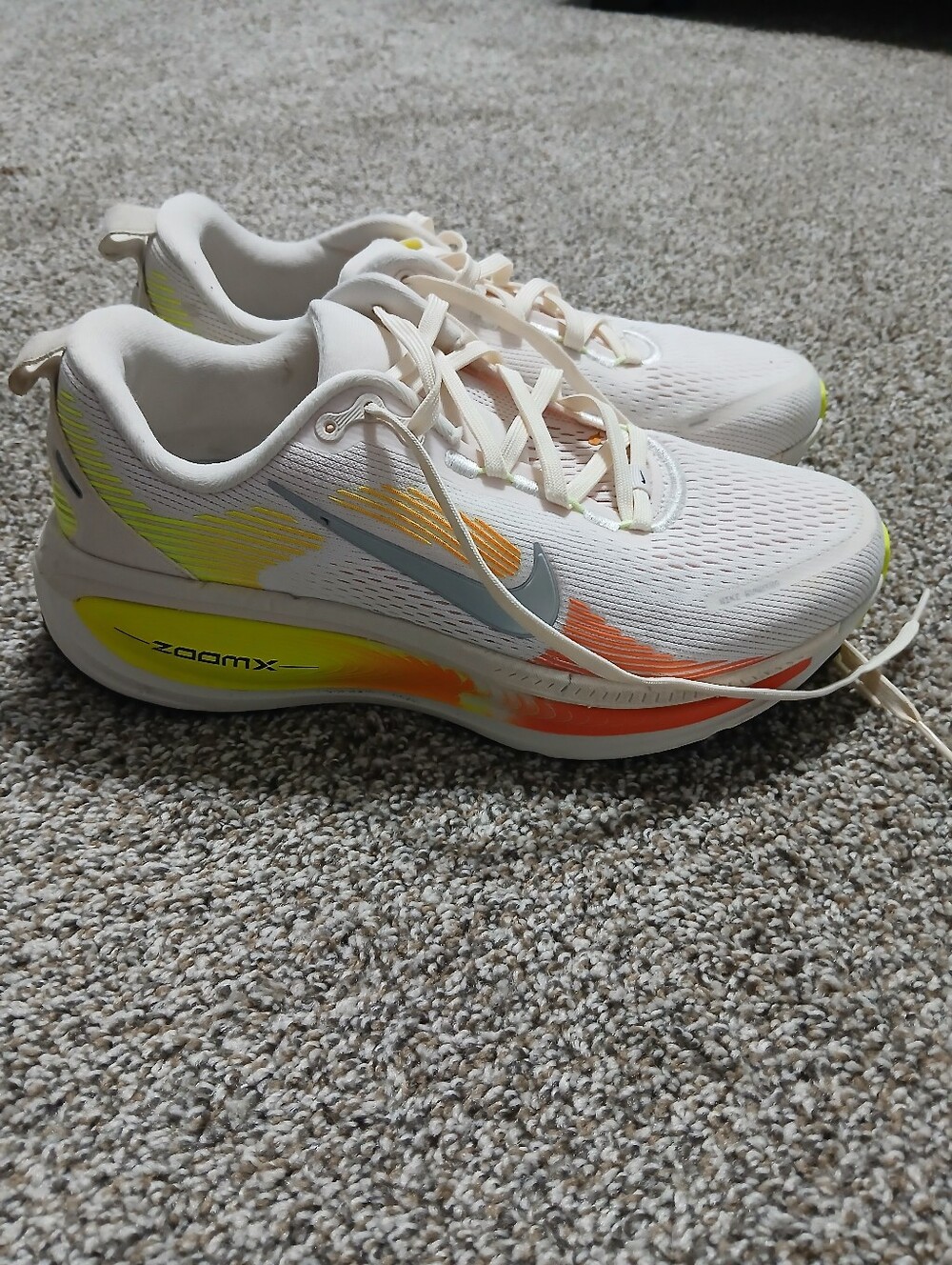 Nike Women's White Running Shoes with Yellow and Orange Accents Size 10